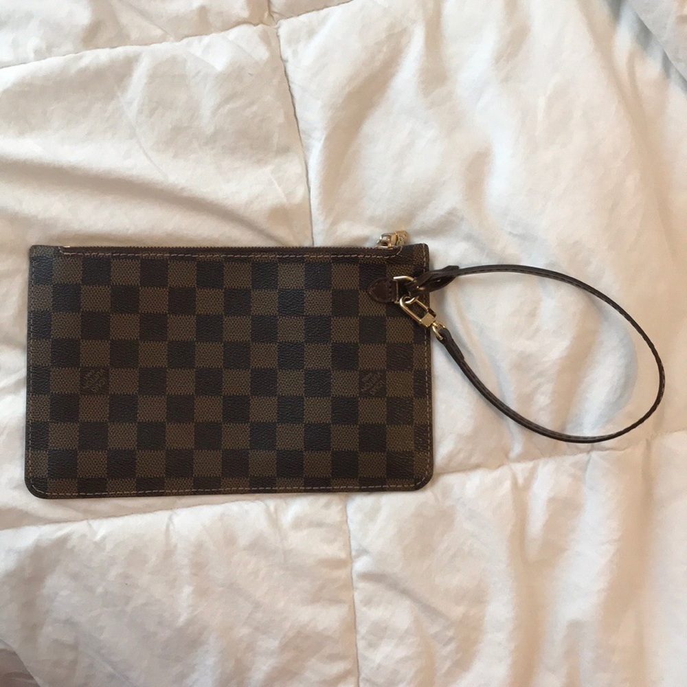Louis Vuitton wristlet in brown